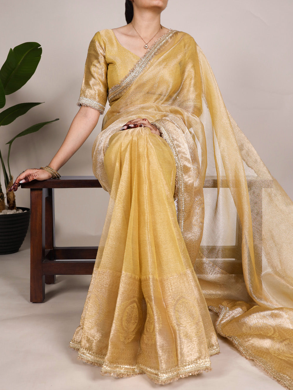 Gold Color Zari Weaving Work With Sequins Border Tissue Shimmer Saree