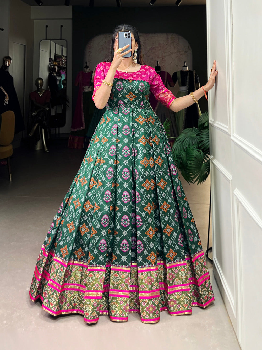 Green Color Jacquard Silk Patola Print With Zari Weaving Work Gown