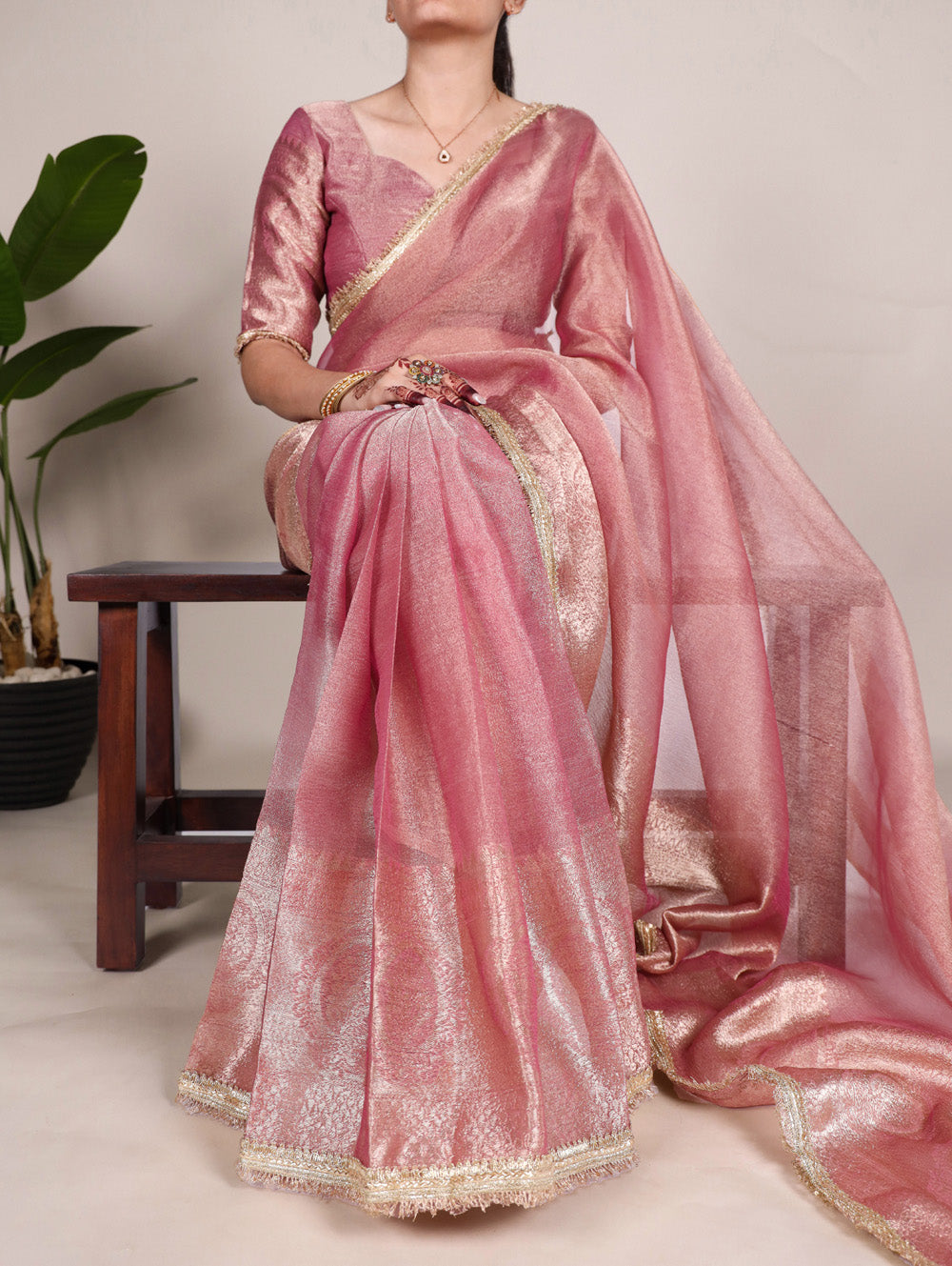 Light Pink Color Zari Weaving Work With Sequins Border Tissue Shimmer Saree